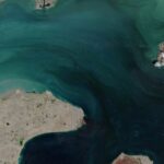 Container Ship Struck in Strait of Hormuz Amid Conflicting Claims Over Waterway Status