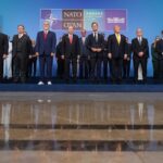 Turkish President Distributes Loaded Revolvers to NATO Leaders at Alliance Summit