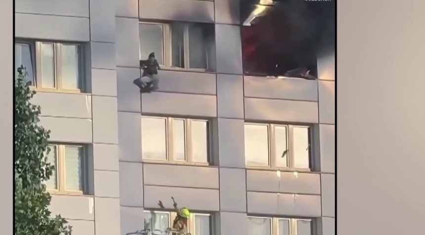 Woman Leaps Into Firefighter Basket as Flames Engulf Berlin Apartment Building