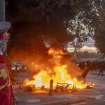 Macron Orders Security Review as Protests Overwhelm French Police Forces
